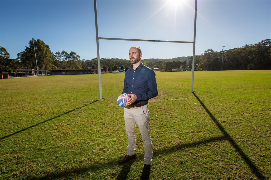Council's Community Assets Delivery Coordinator Brent Wellham on the recently completed rugby league field at Croudace Bay Sports Complex.jpg