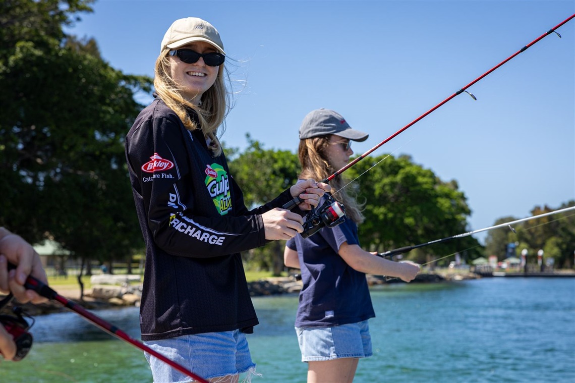 Ella Butcher and Charli Guest wet a line at Pelican on Thursday in preparation for Let's Fish.jpg