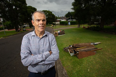 Waste Services Manager Paul Collins on a Warners Bay street awaiting bulky waste collection.jpg