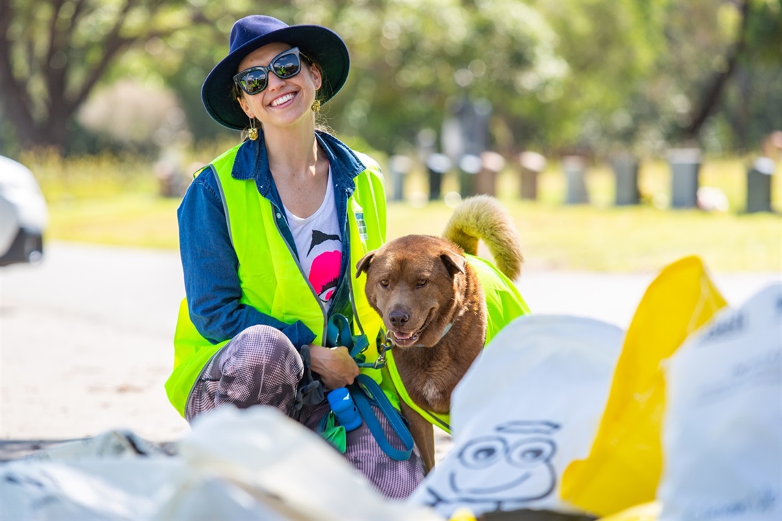 Simone Soeters and Cyrus the dog at a previous Clean Up Australia Day site at Whitebridge.jpg
