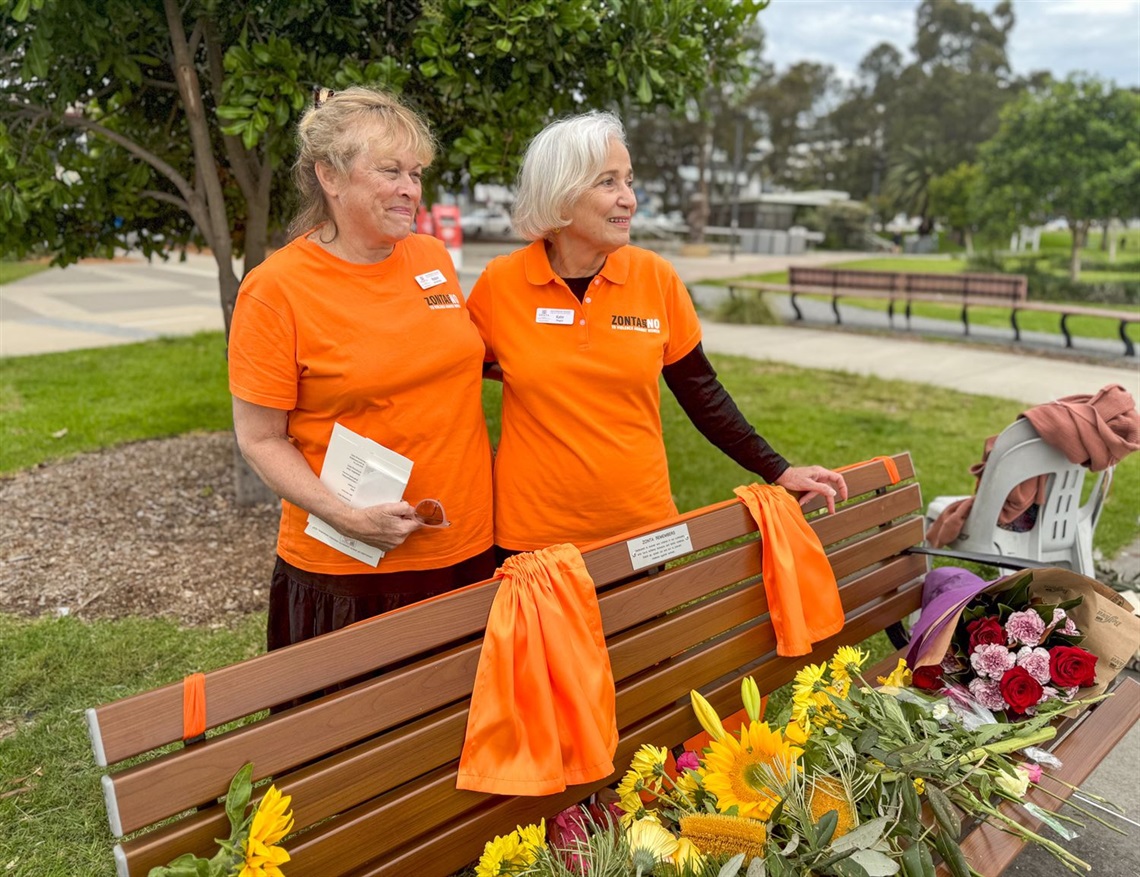 Zonta Club members Robin and Kate (left to right) at the new DV memorial bench at Warners Bay.jpg