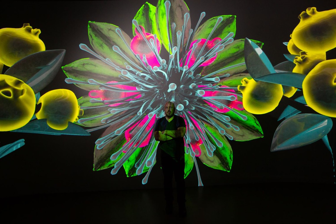 Artist Joel Zika with his digital artwork at MAP mima.jpg