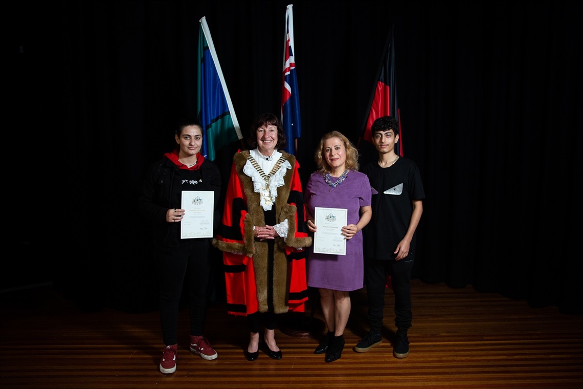 The family at Friday's citizenship ceremony, with Lake Macquarie Mayor Kay Fraser.jpg