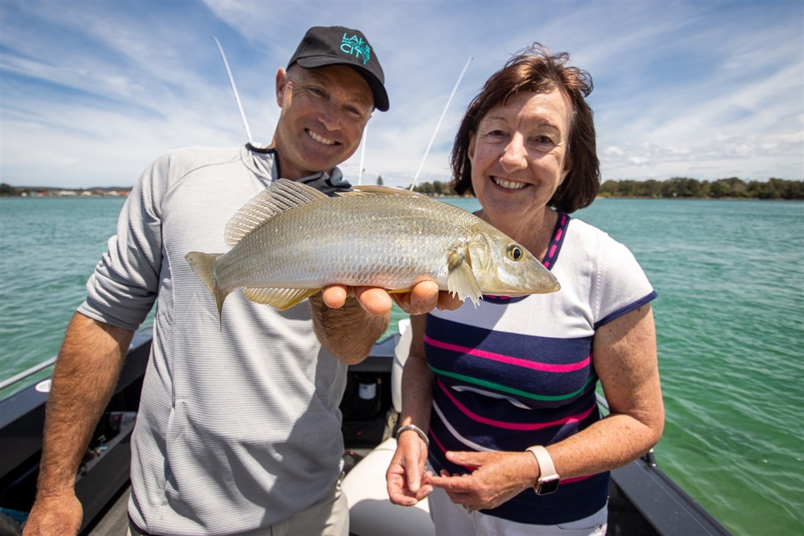 Let's Fish Event Director Michael Guest and Mayor Kay Fraser on Lake Macquarie on Wednesday 3 November.jpg