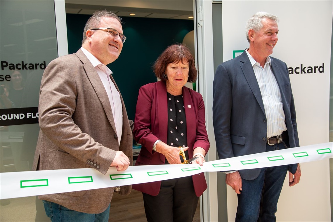 Mayor Kay Fraser and HPE representatives cut the ribbon on the new centre.jpg