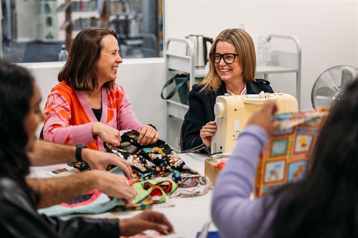 Marsha Rodrom and Kristie Ferguson in the textiles area at Toronto Library.jpg