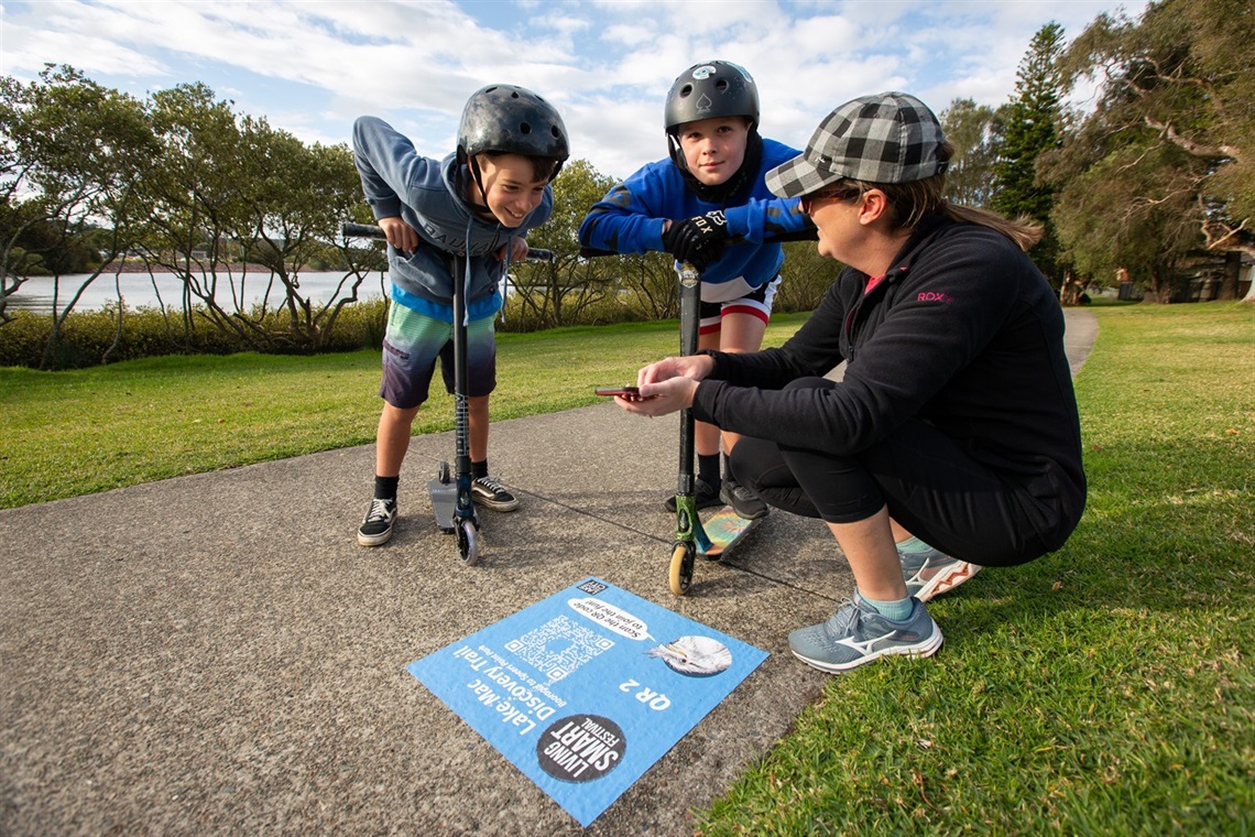 Warners Bay resident Maddy Koosmen on the Booragul Discovery Trail with sons Brody, 9, and Ethan, 12.jpg