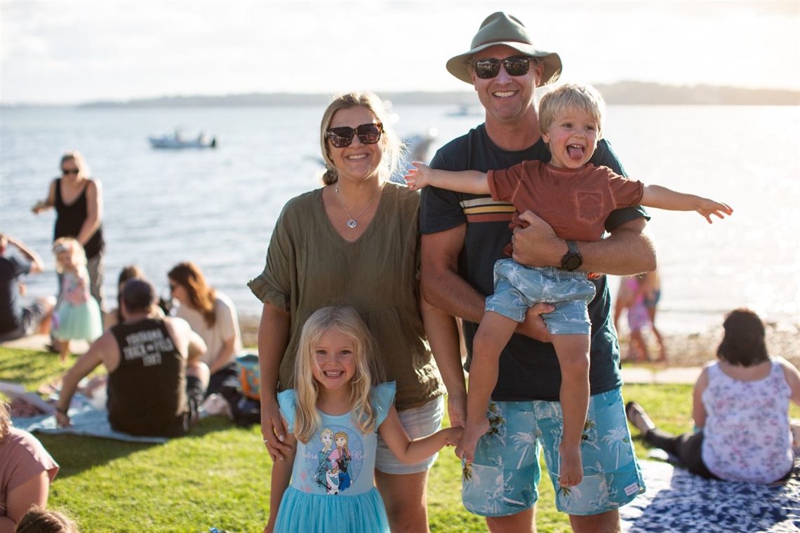 Natalie and Scott Thompson and their children Matilda and Mason enjoying the Lake Mac lifestyle at Warners Bay foreshore.jpg